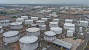 Petroleum refinery and storage tanks representing new chemical projects in Gujarat